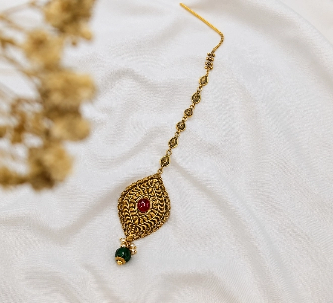 Antique Gold Leaf-Shaped Maang Tikka with Red Stone & Green Bead Drop
