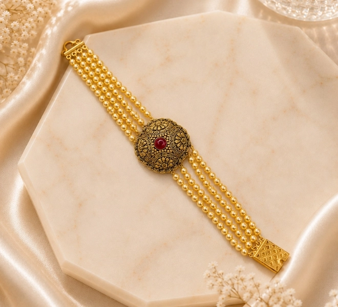 Gold Pearl Bracelet with Ruby Red Stone Centerpiece