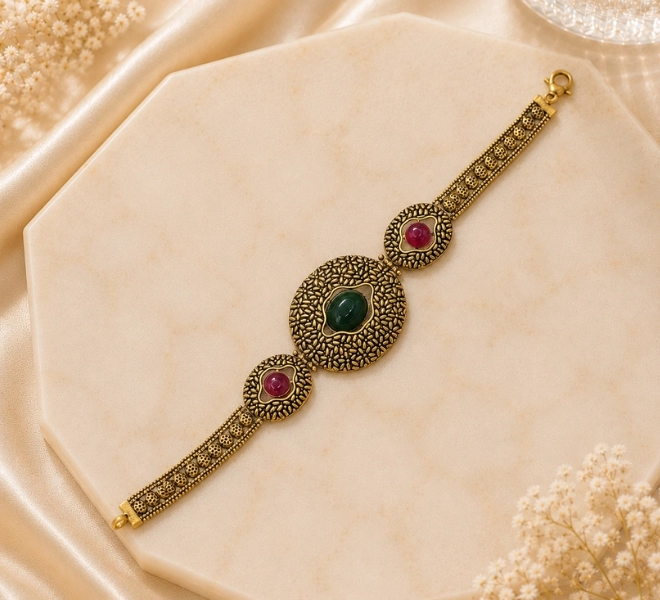Gold Oval Bracelet with Green & Ruby Stone Accents