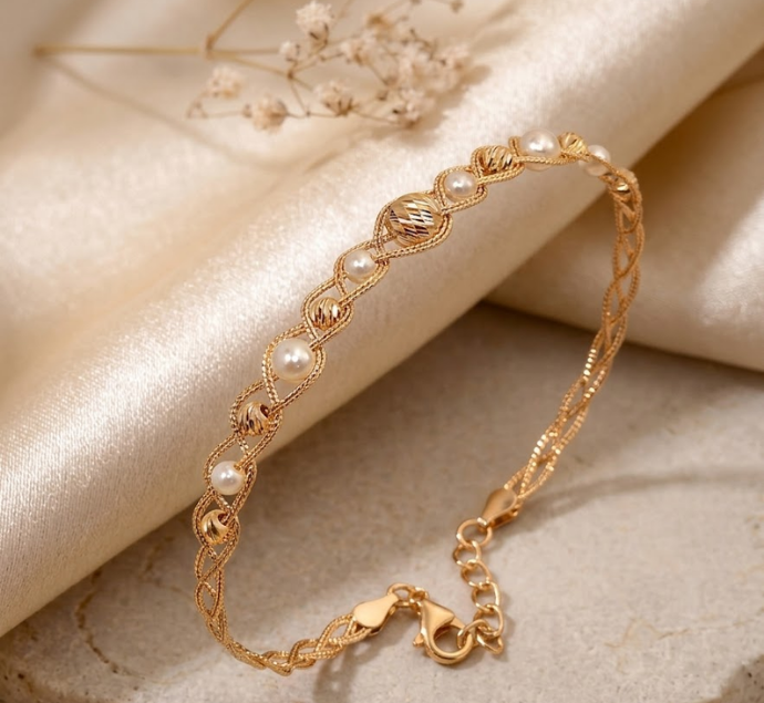 Elegant Pearl & Gold Twist Bracelet