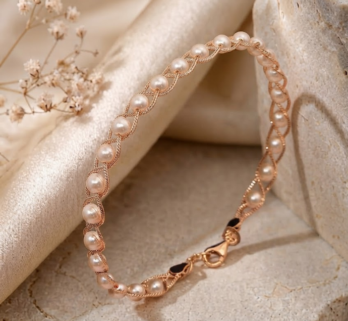 Elegant Interwoven Rose Gold and Pearl Bracelet